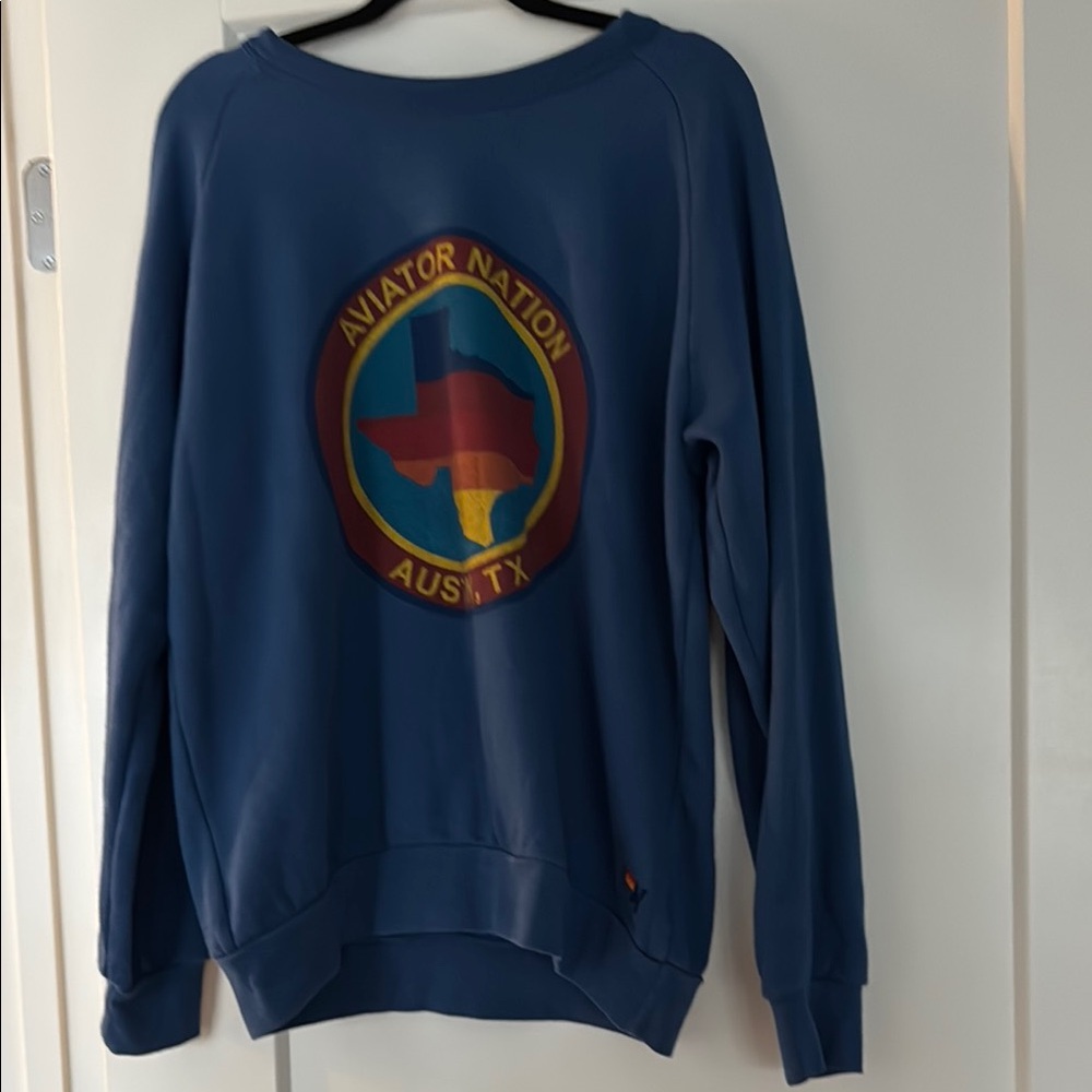 Blue Sweatshirt with Rainbow Logo